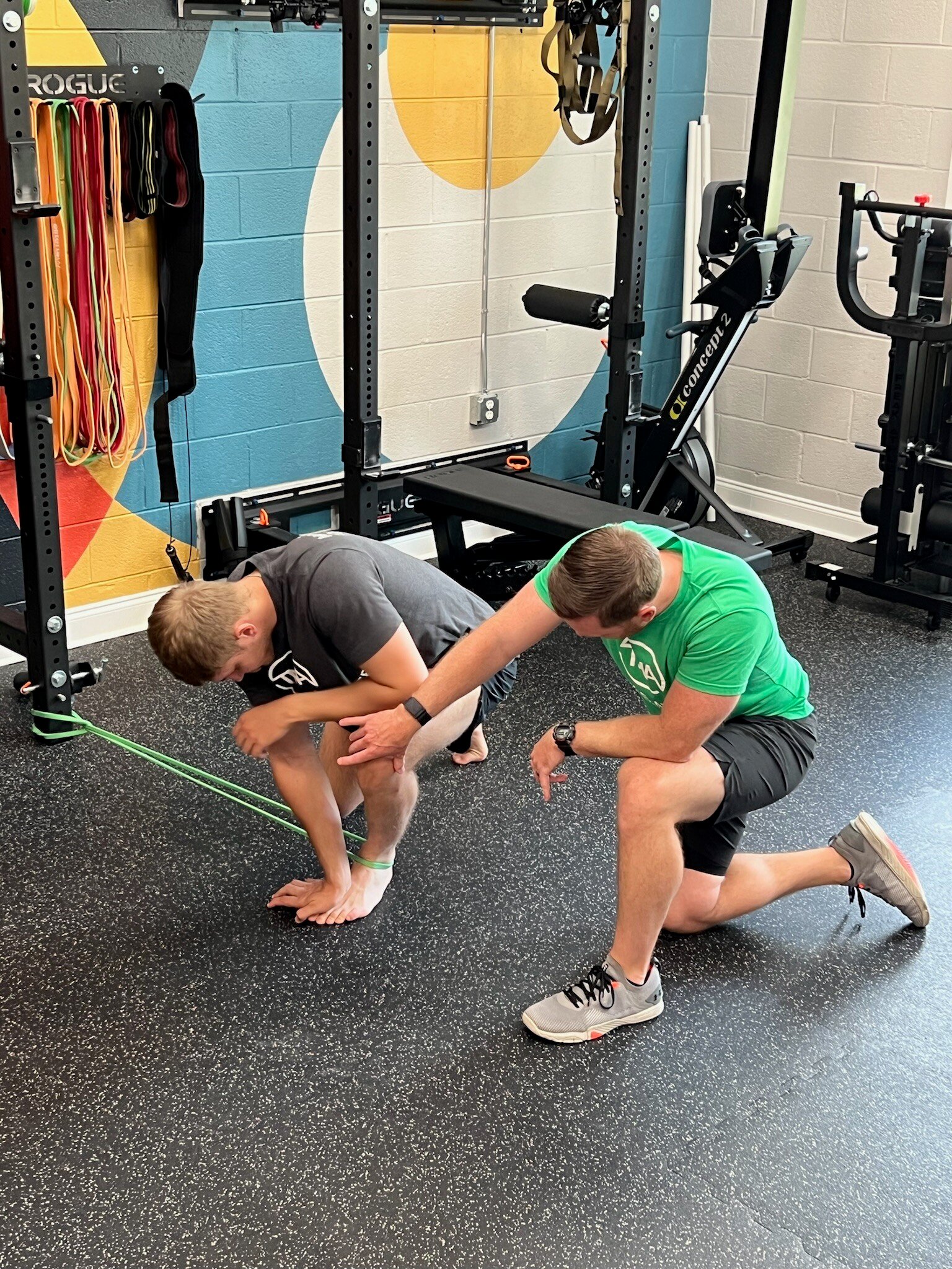 physical therapist working on ankle strength